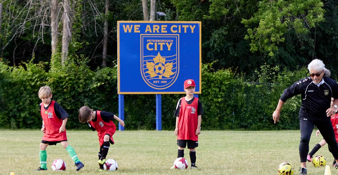 The new We Are City sign in Eastgate Memorial Park, Peterborough, Ontario