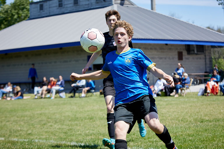 PCSA player controlling the ball.