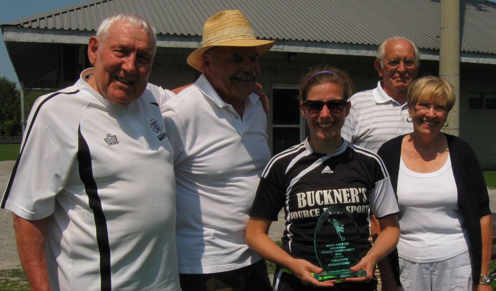Fred and Margaret Forster present the Womens Trophy to Welland Buckner’s Sports team captain Miranda Rodrigue