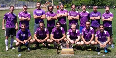 Soccer Plus Junction pose with the Mark Forster trophy for Men